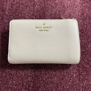 Kate Spade light pink leather wallet
